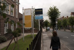 Symptom, 2011 (detail). Installation of 30 found local estate agent signs on the railings of Wimbledon College of Art (London, September 2011). Dimesions variable. 